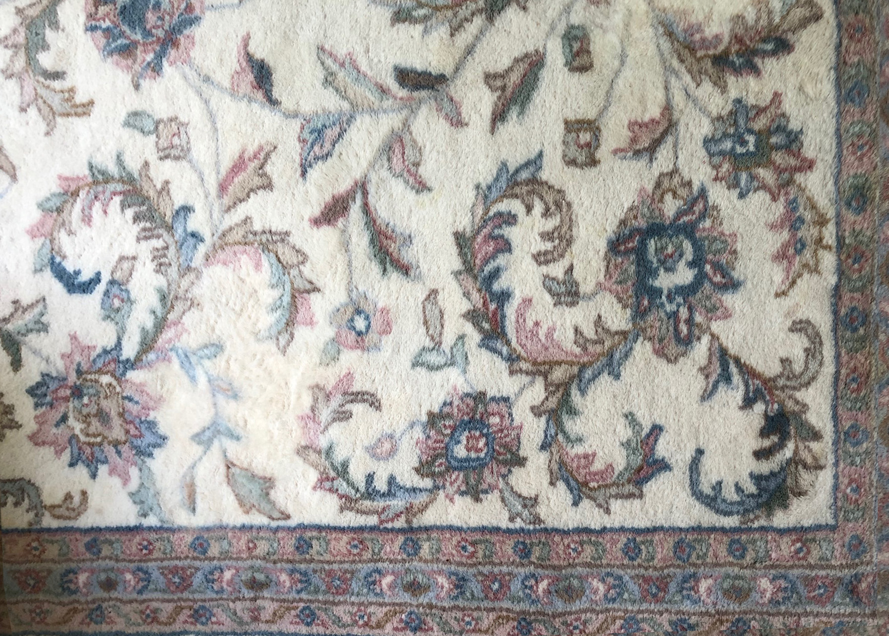 After-Pet stain removal and color restoration on Persian rug.